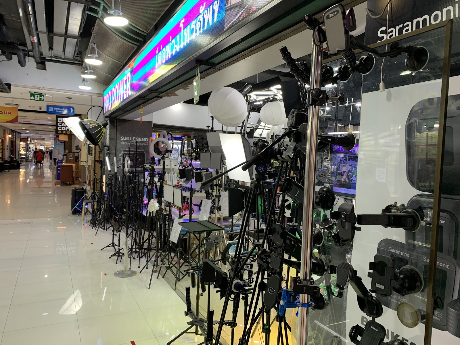 A camera accessories shop at Fortune Town with tripods and lighting on display
