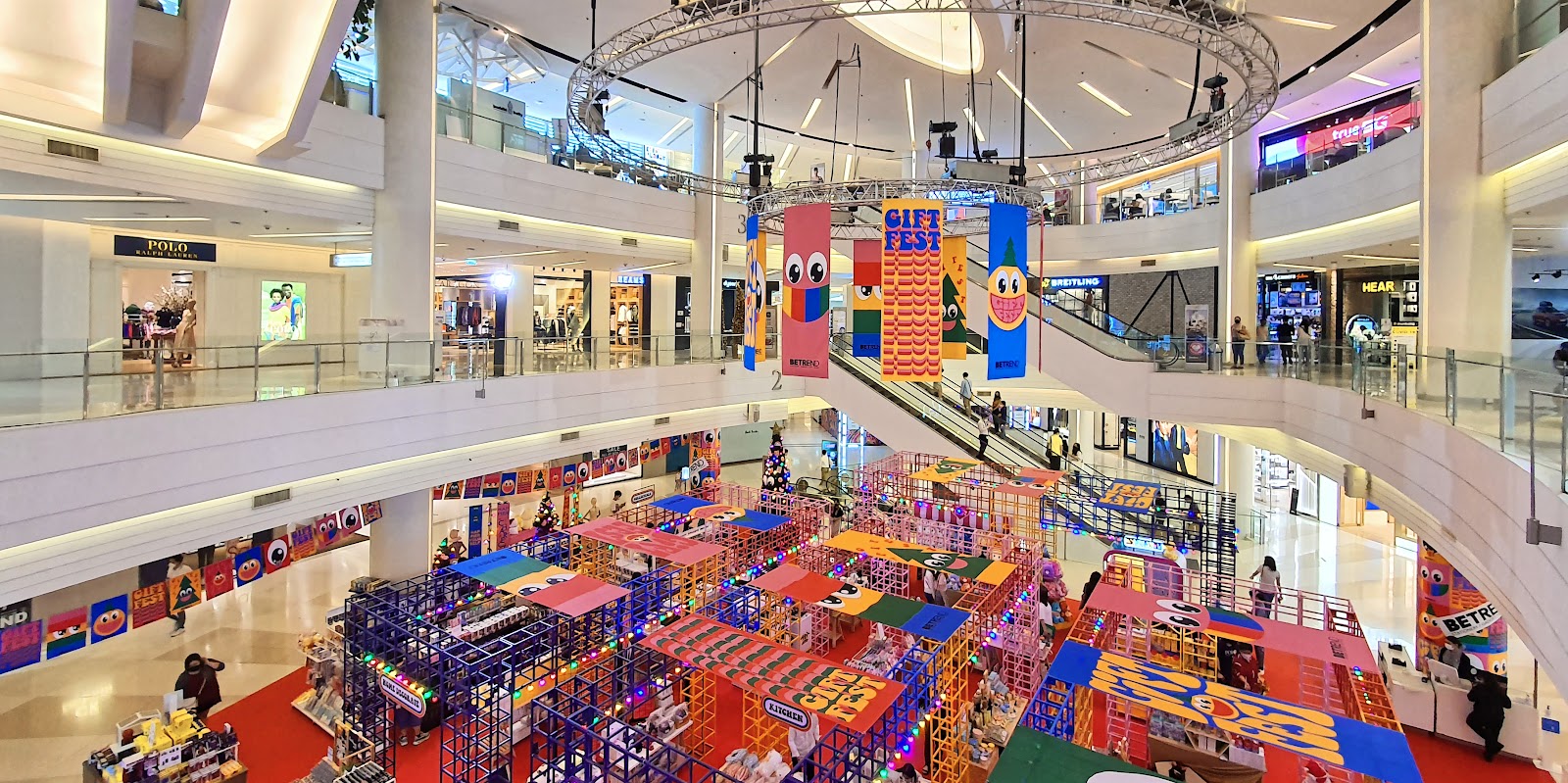 Wide view of the central atrium of Siam Paragon with its escalators and upper floors