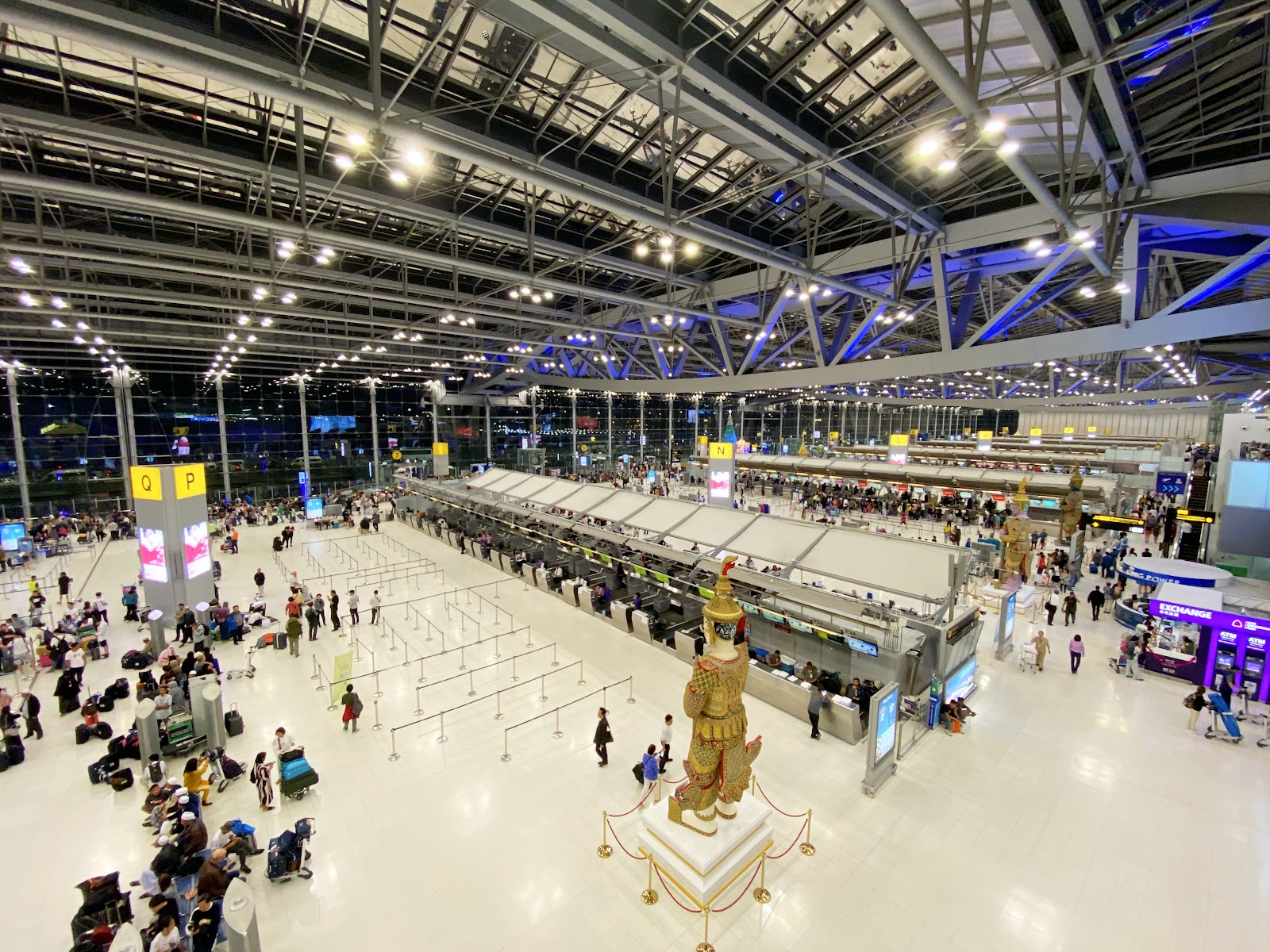 The long check-in hall at Suvarnabhumi Airport under its steel roof