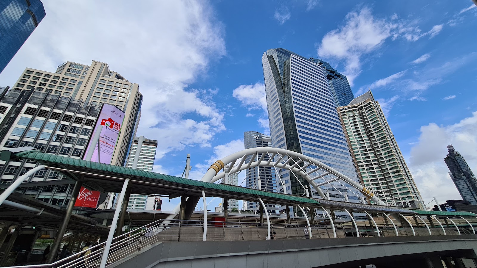 Office towers around the curved Chong Nonsi Skywalk in the Sathorn business district