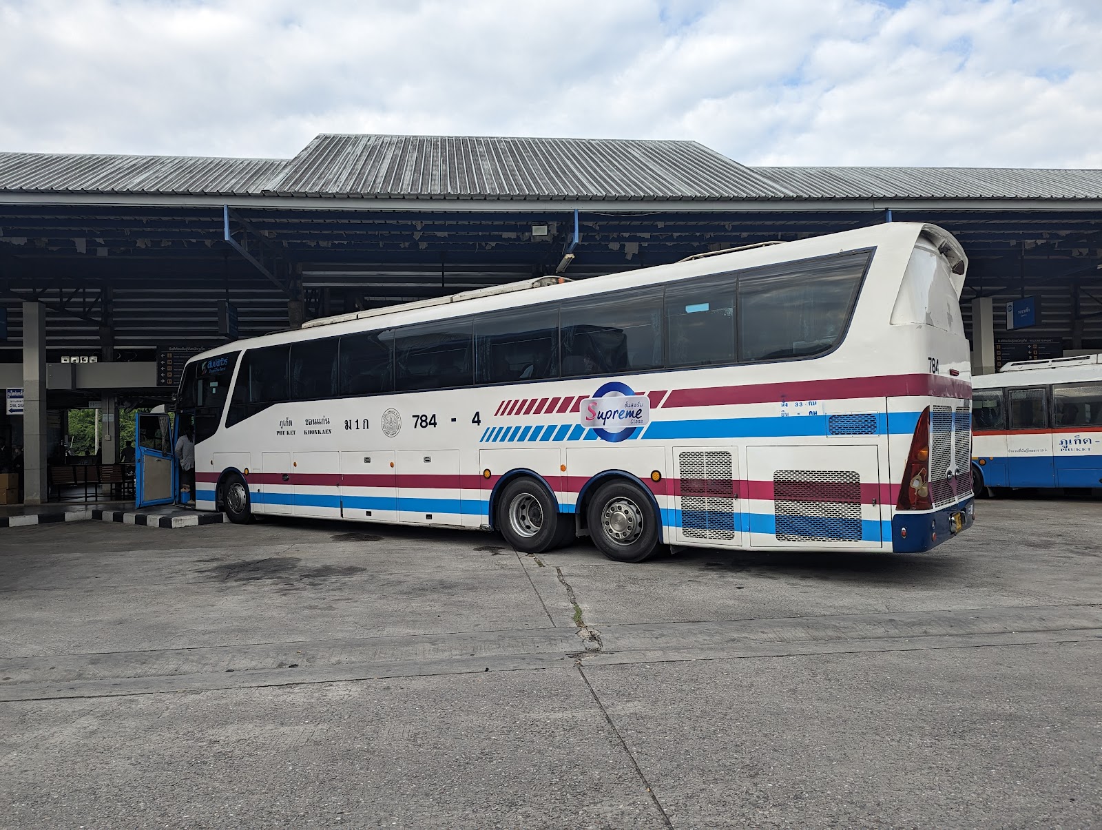 A long-distance coach parked at the bays of Phuket Bus Terminal 2