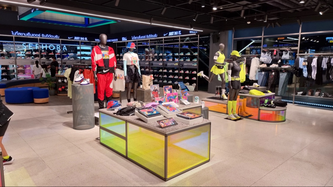 Sneaker and apparel displays inside the Nike Bangkok store at Siam Center