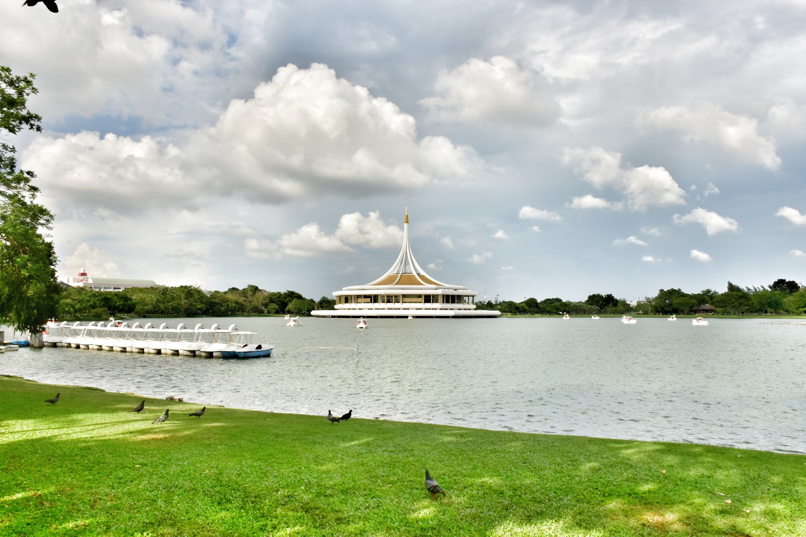 The lake at Suan Luang Rama IX with the white spire of the Ratchamongkol Hall on the far shore