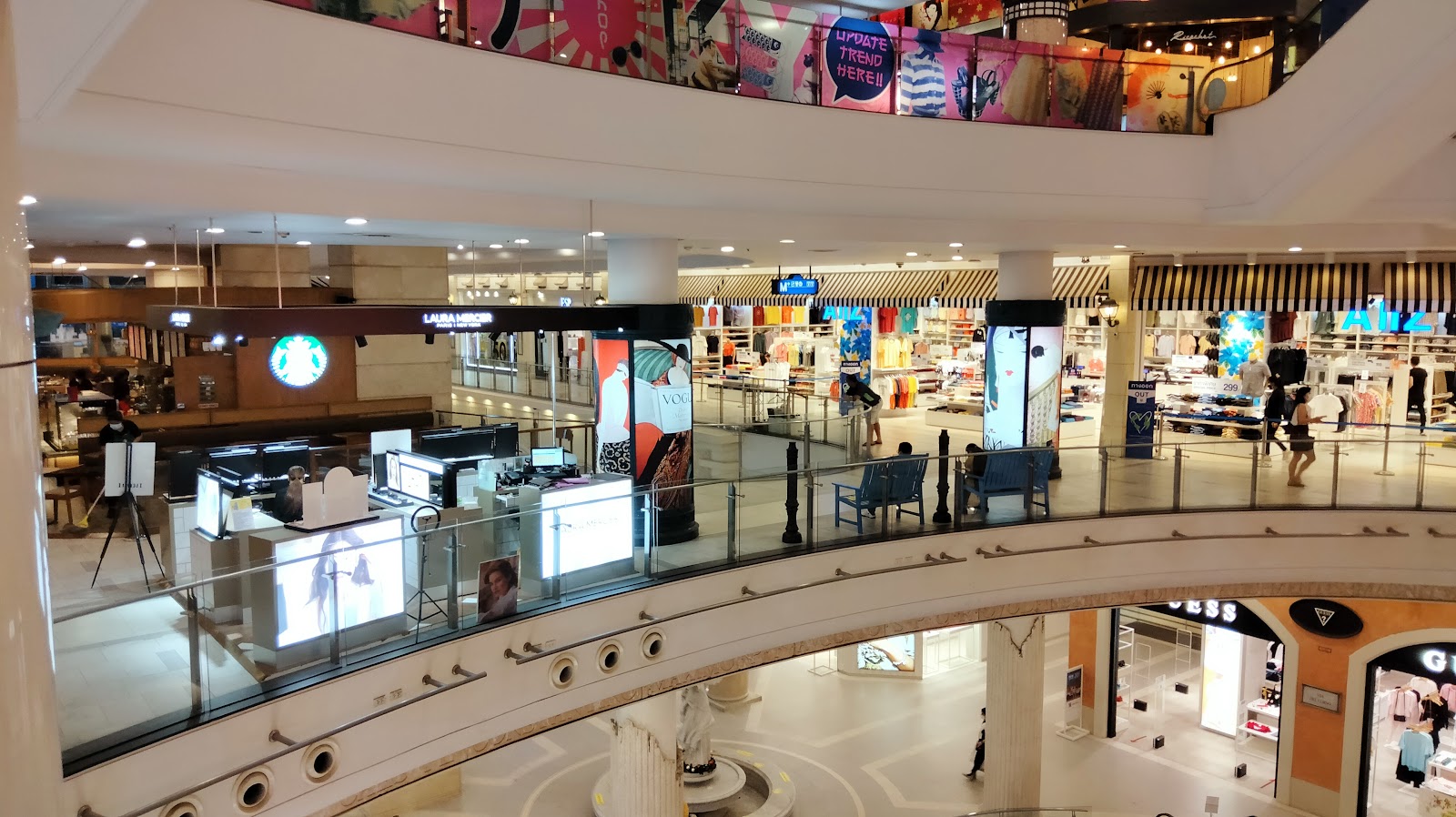 Shops around the circular balconies of the atrium at Terminal 21 Asok