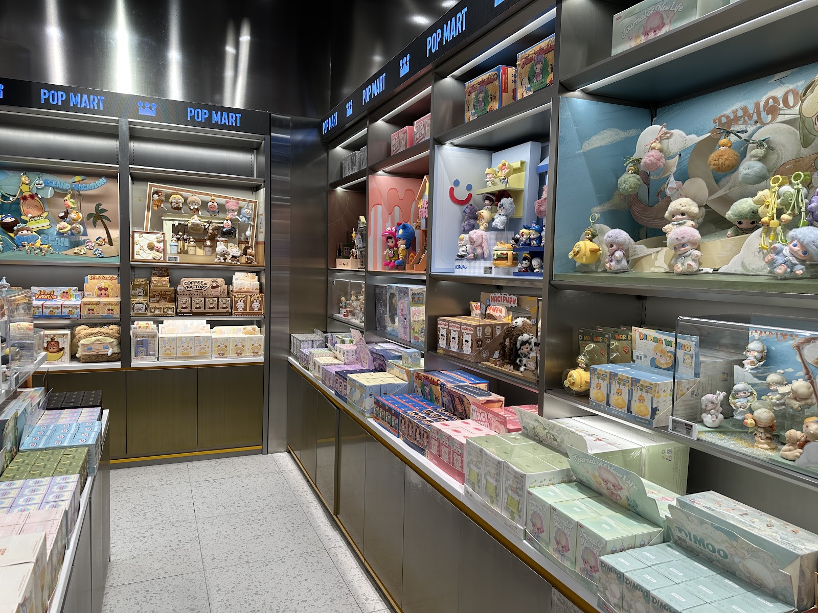 Shelves of POP MART designer toy figures inside the CentralWorld store