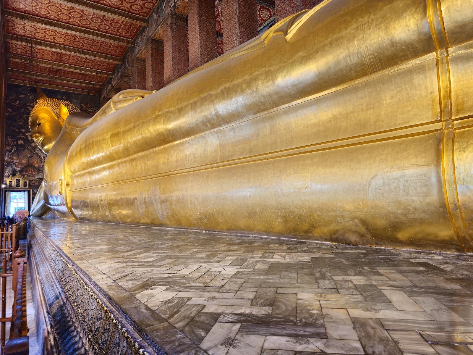 The gilded Reclining Buddha inside its hall at Wat Pho
