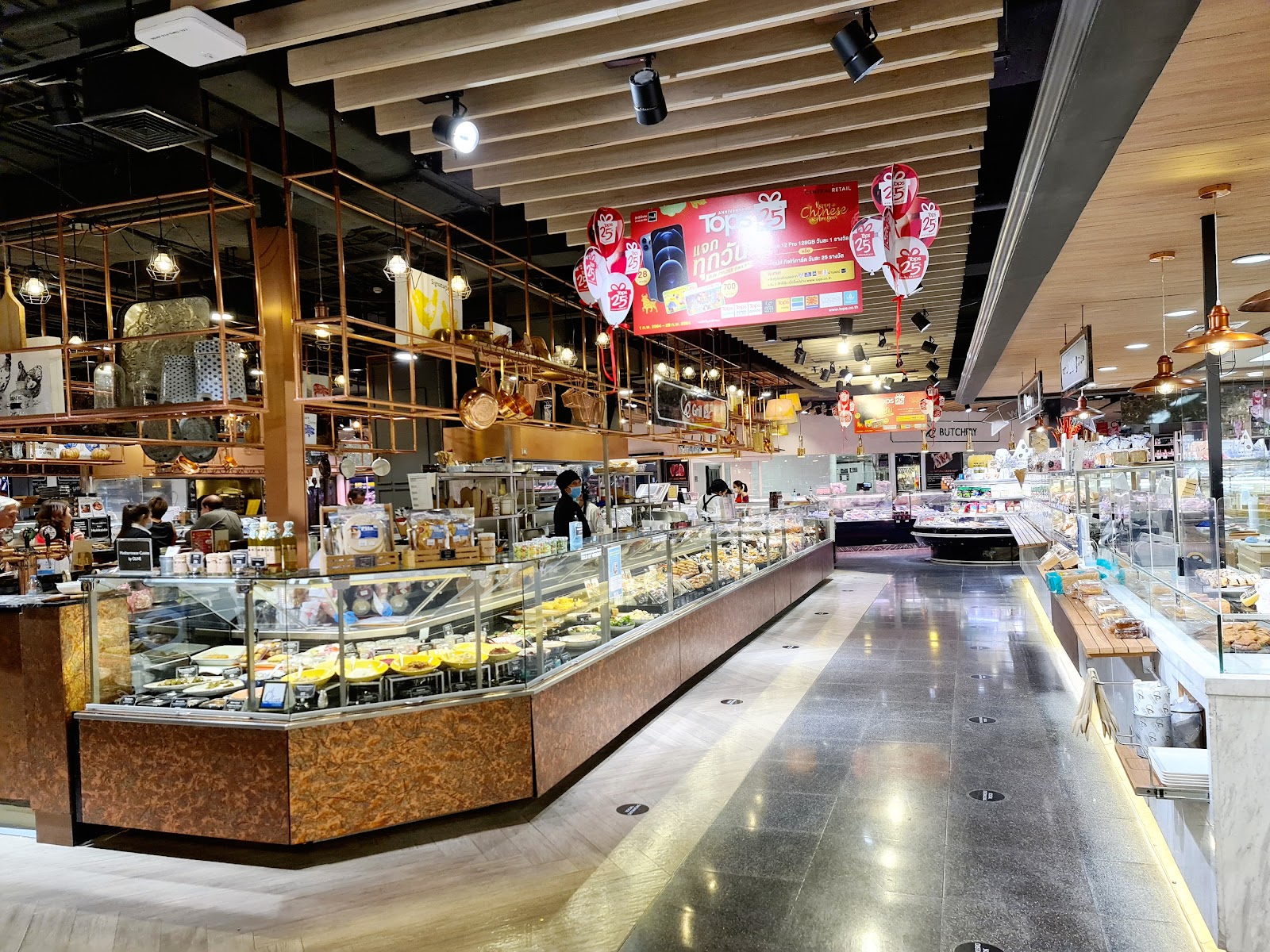Aisles and deli counters inside Tops Food Hall at Central Chidlom