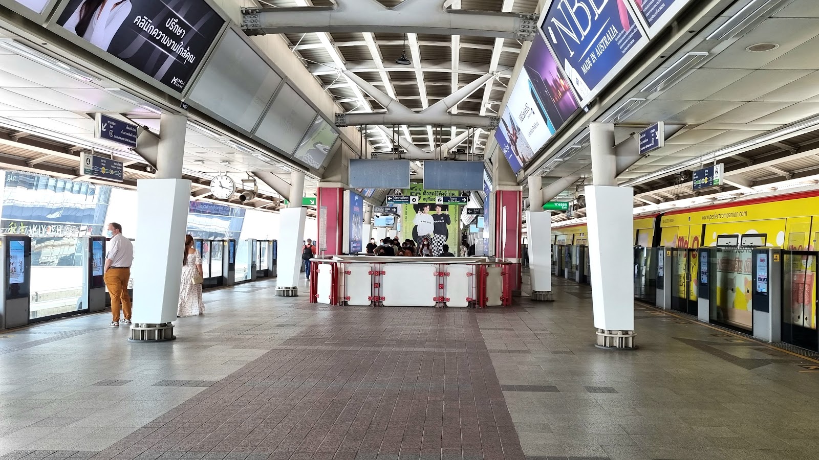 Concourse of BTS Siam station with ticket gates and platform screen doors