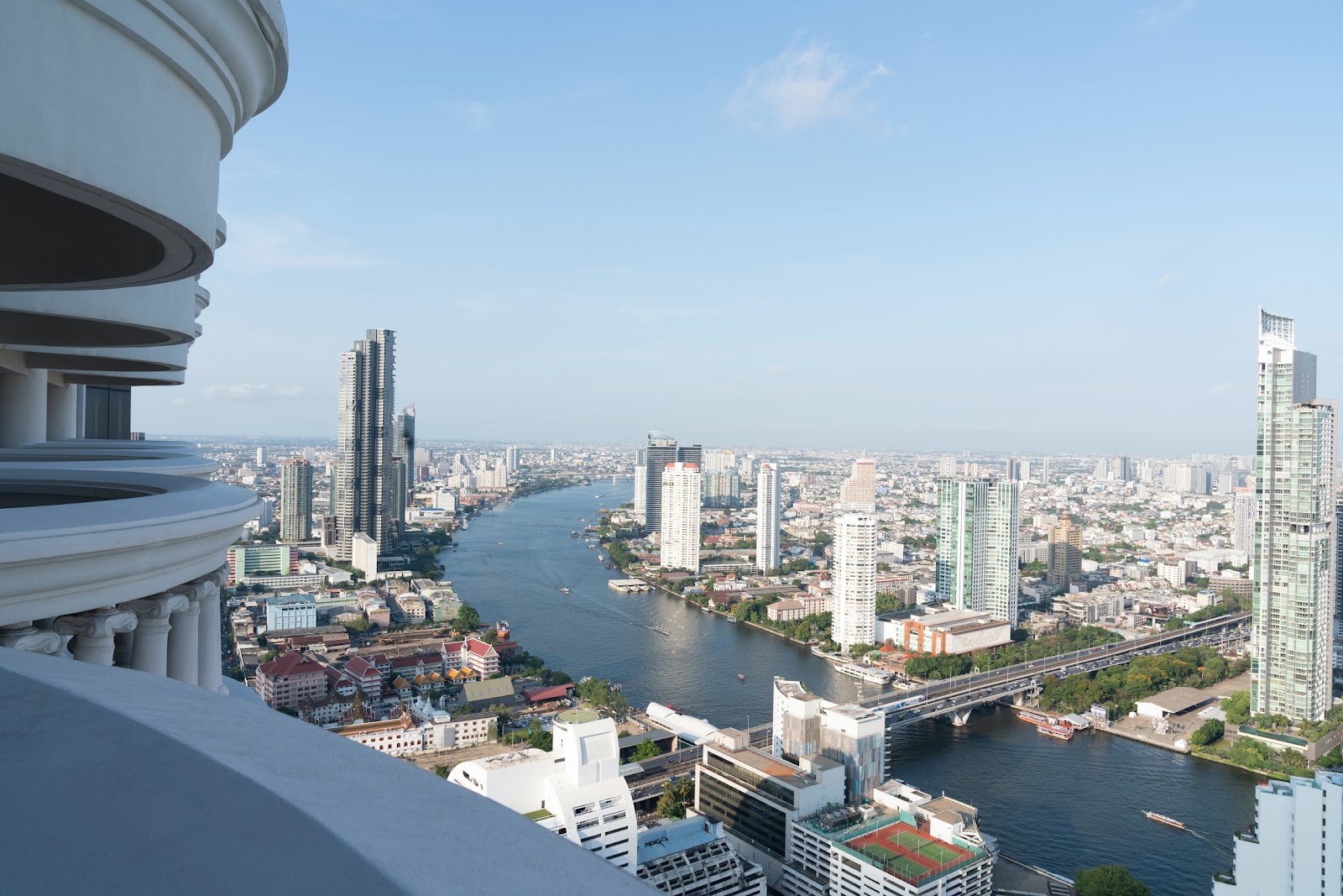View from a high balcony of State Tower over the curve of the Chao Phraya
