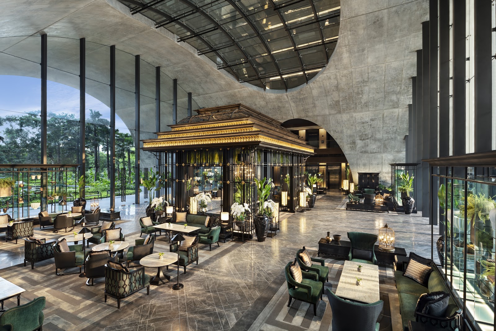 The Lobby Lounge under a vaulted concrete ceiling with a Thai pavilion at its center