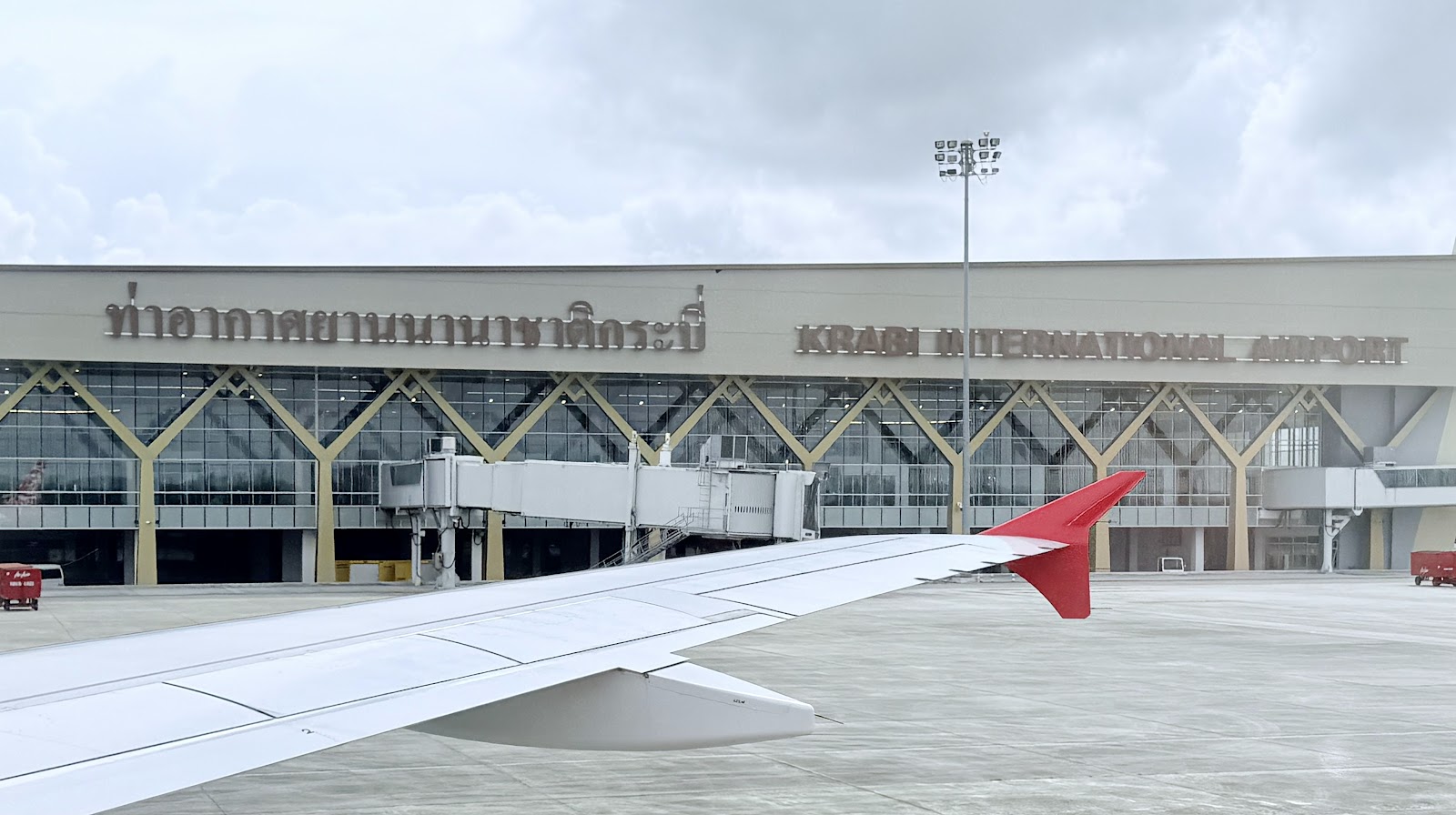 The Krabi International Airport terminal seen from an aircraft on the apron