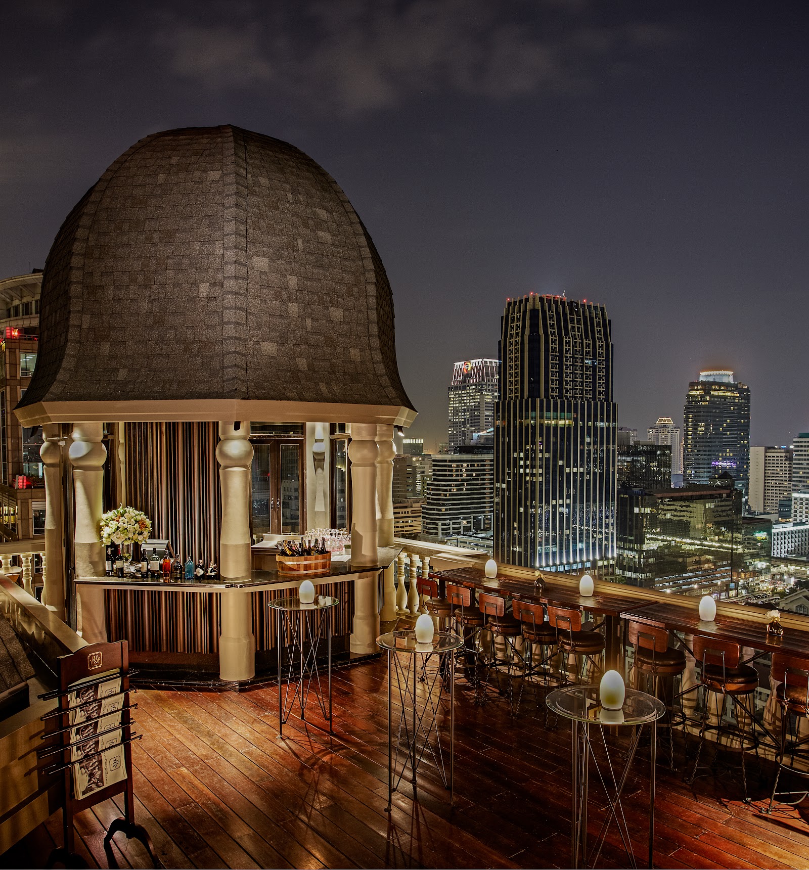 A domed corner of The Speakeasy rooftop bar at night in Bangkok