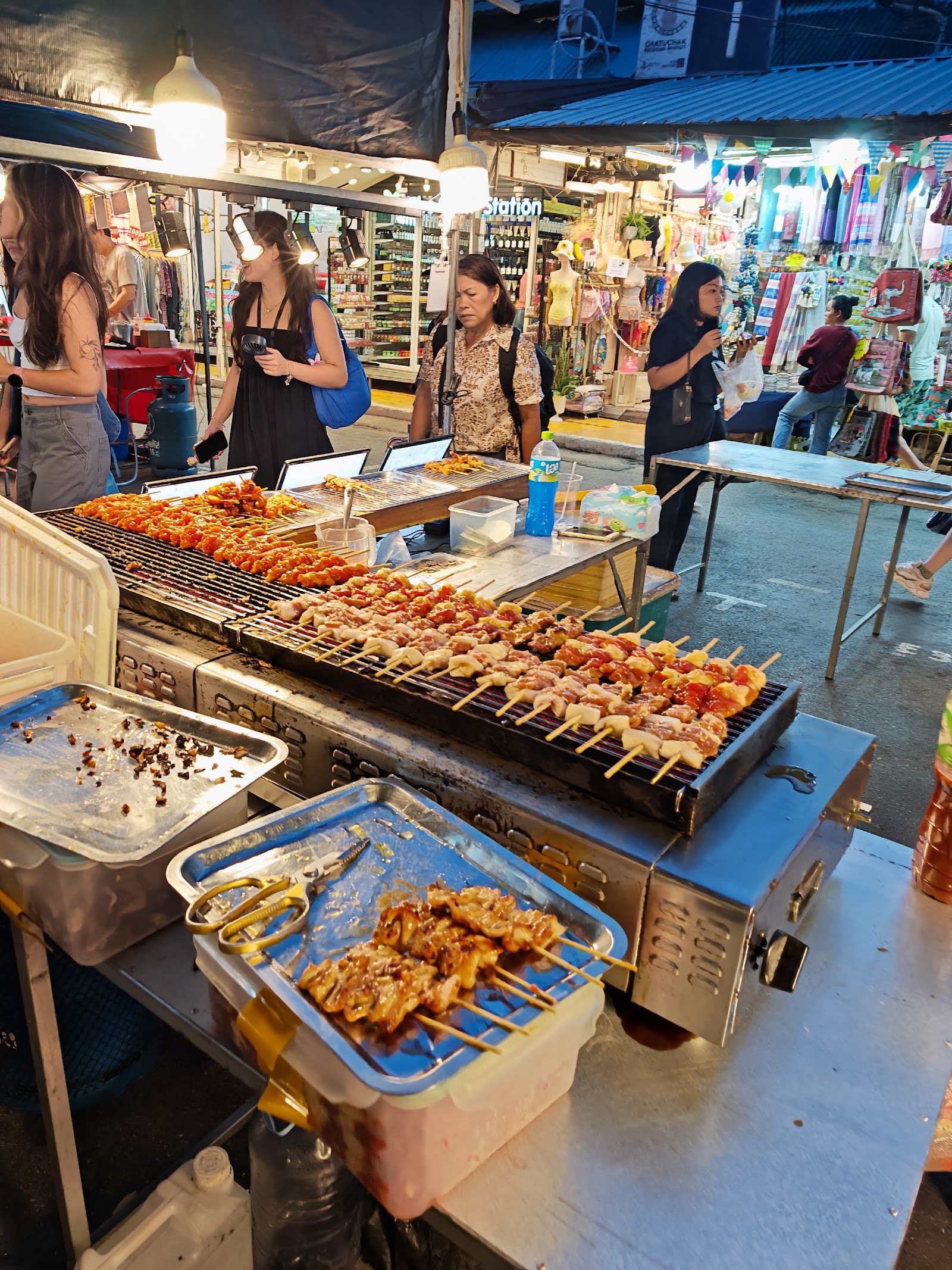 Grilled skewers on a street-food stall at Chatuchak Weekend Market