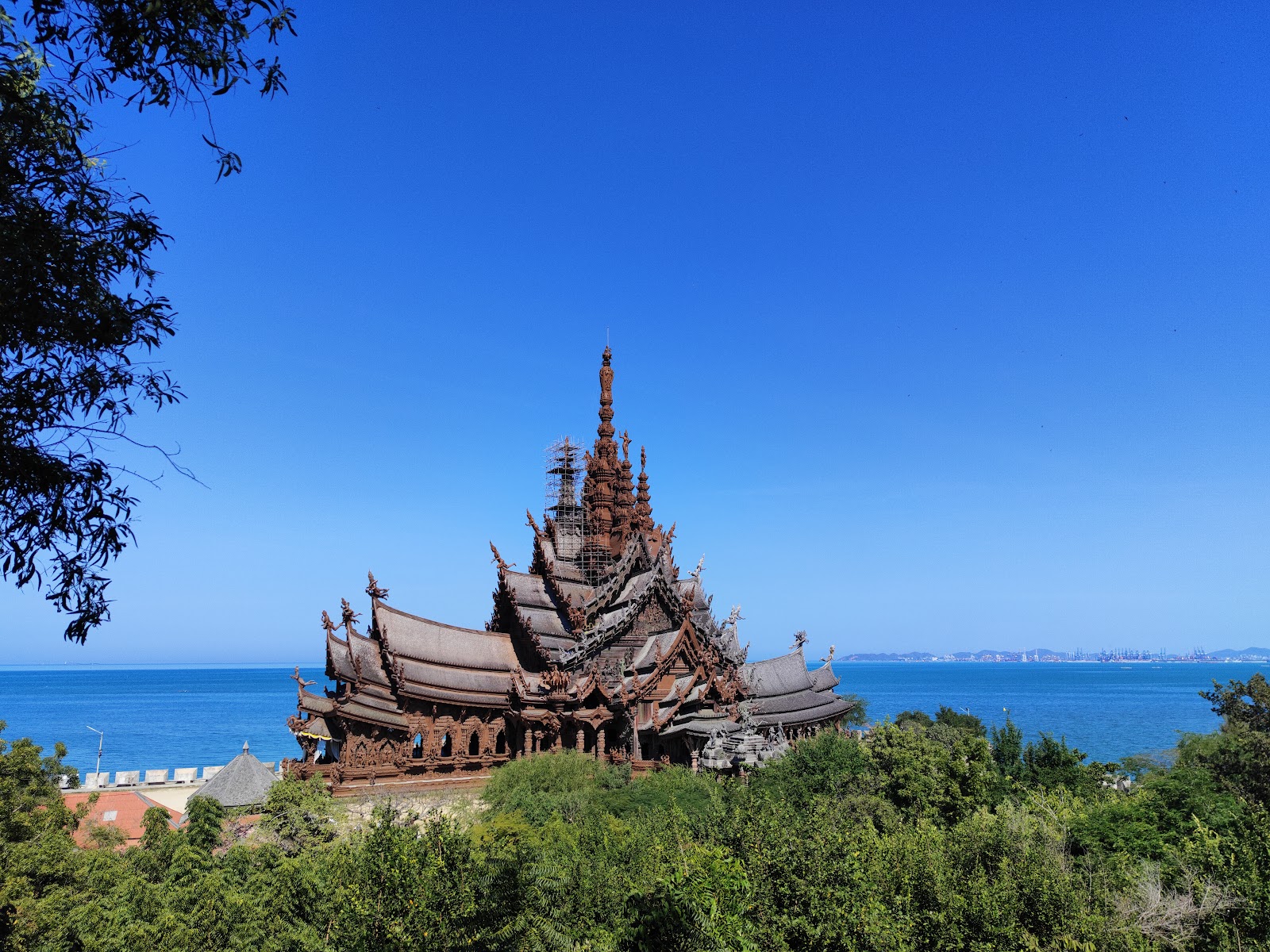 The carved wooden spires of the Sanctuary of Truth above the sea at Laem Ratchawet