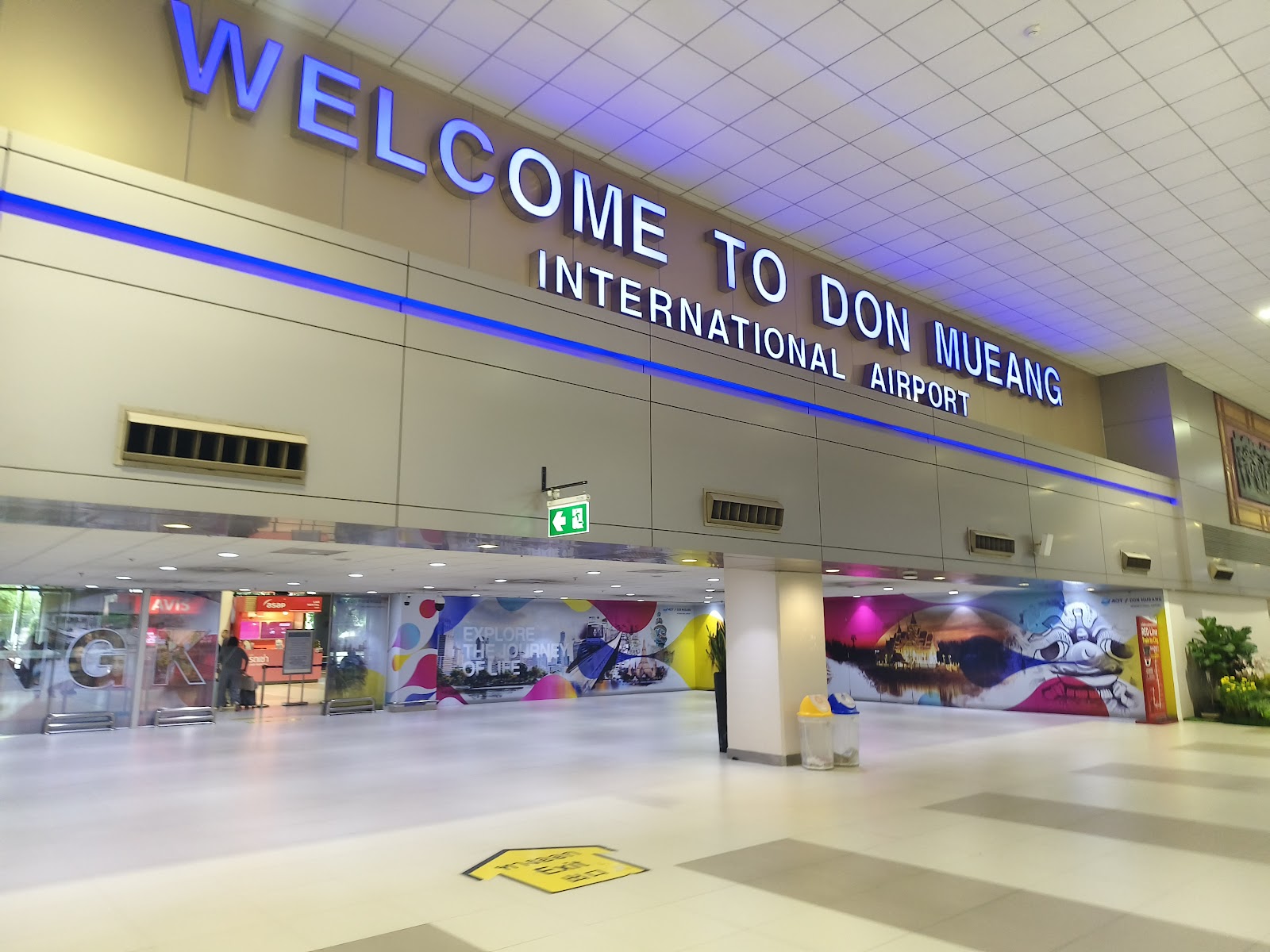 Welcome to Don Mueang International Airport sign above the arrivals hall
