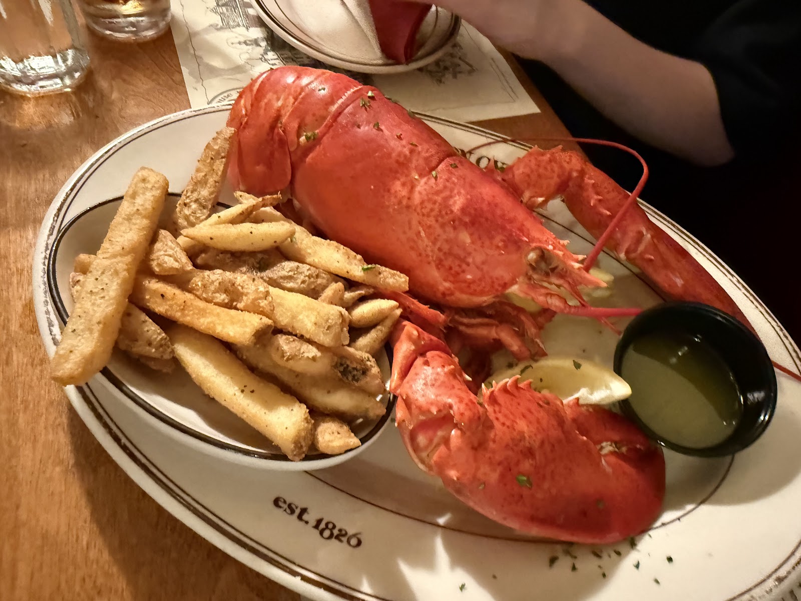 Whole lobster with fries on a Union Oyster House plate marked est. 1826