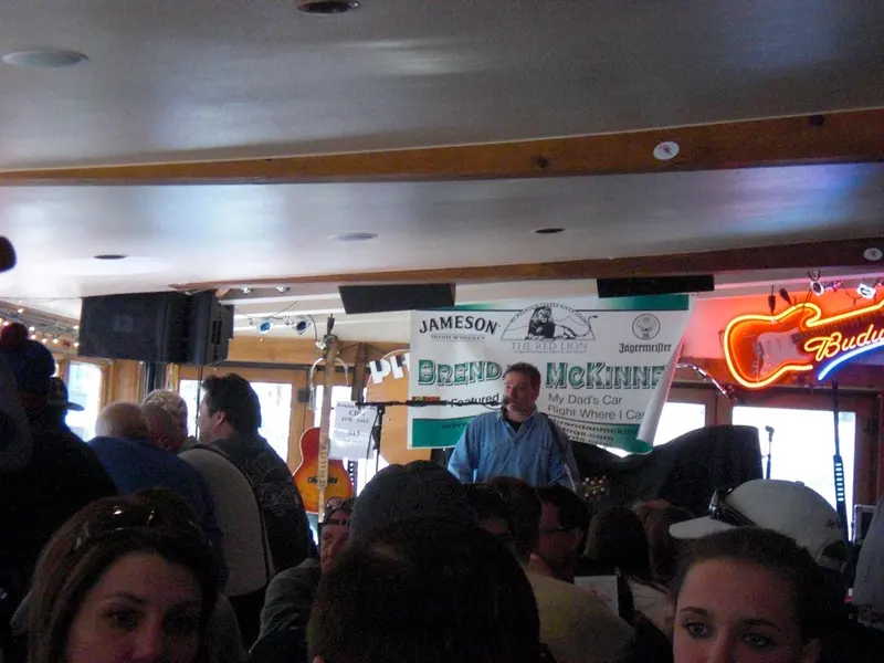 Crowd and live music inside the Red Lion bar